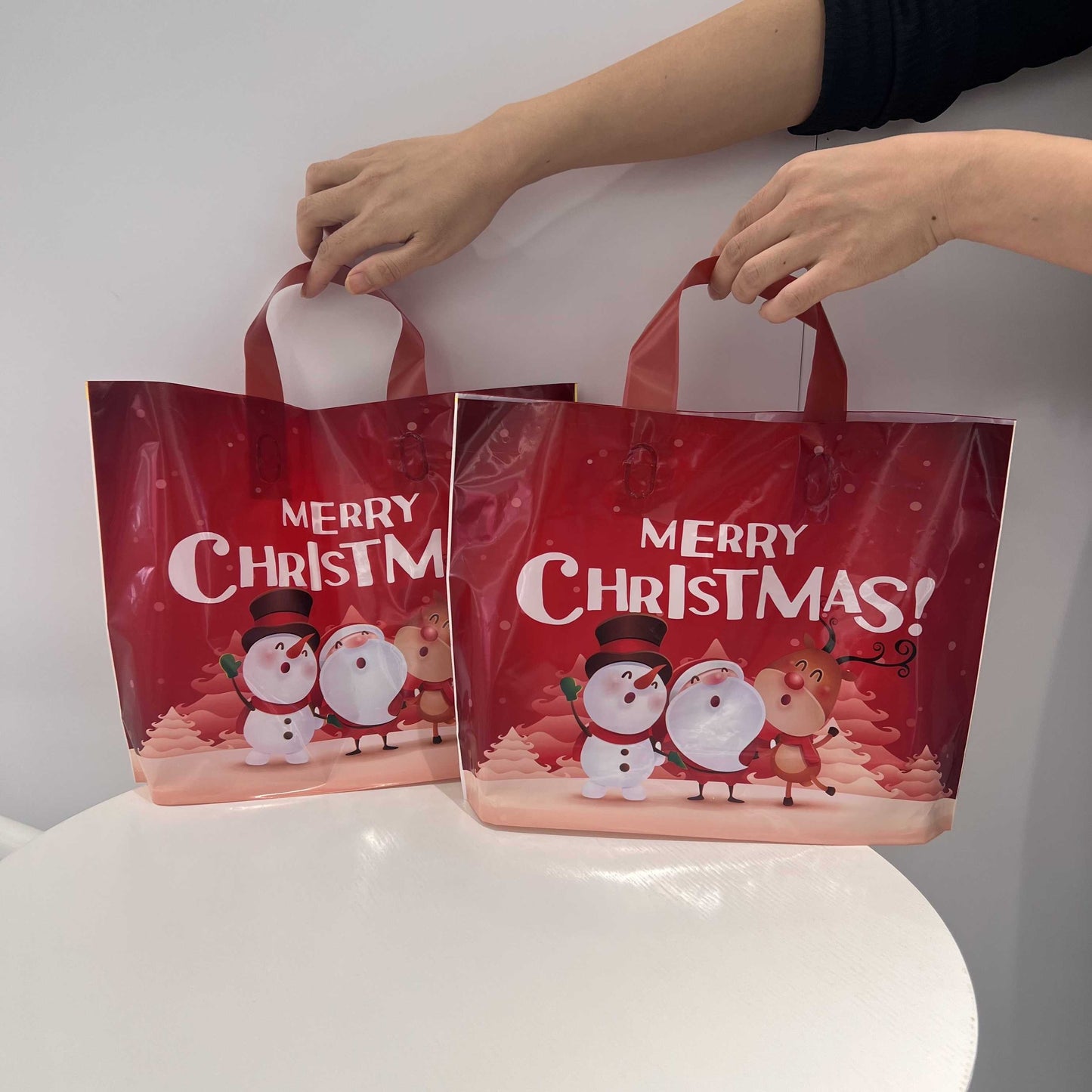 [Customer Favorite] 50pcs Red Christmas Gift Bags - Durable PE Plastic Tote for Holiday Presents, Shopping & Party Favors