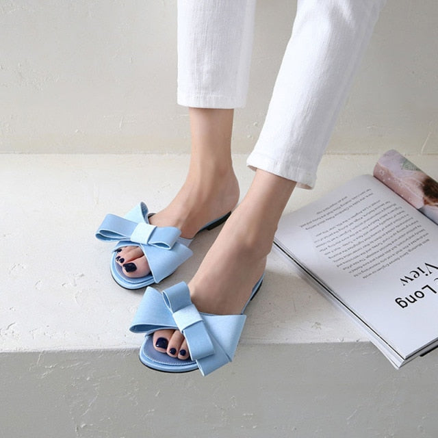 Wearing flat slippers women's shoes  Korean version of the summer new large bow satin round head sandals Wild half slippers