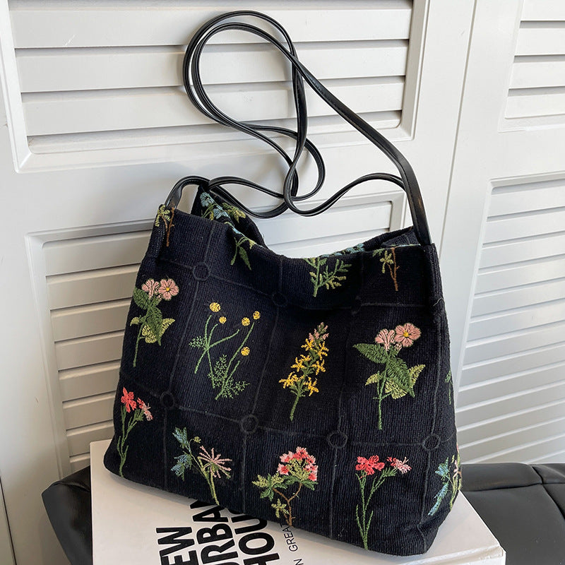 XIANGTUIBAO Large Capacity Embroidered Tote Bag for Women  Spring and Summer New Niche Canvas Embroidered Shoulder Bag Commuter Bucket Bag