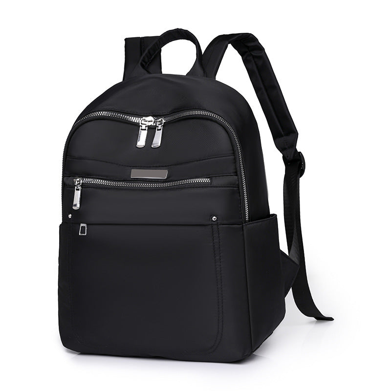 XIANGTUIBAO 2025 Solid color fashion casual versatile backpack simple trend lightweight business women's computer bag wholesale student schoolbag