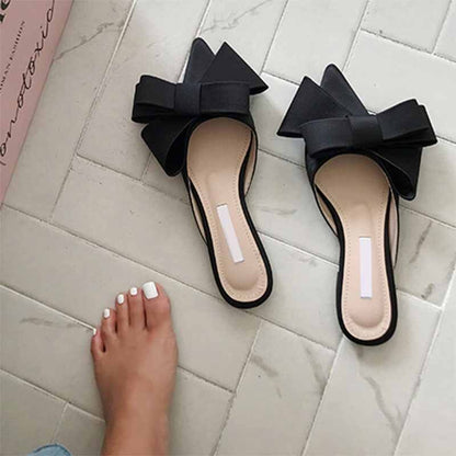 xiangtuibao  spring and summer women's shoes Korean satin big bow pointed sandals and slippers Baotou flat heel half slippers