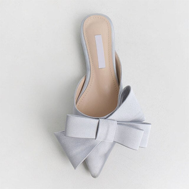 xiangtuibao  spring and summer women's shoes Korean satin big bow pointed sandals and slippers Baotou flat heel half slippers