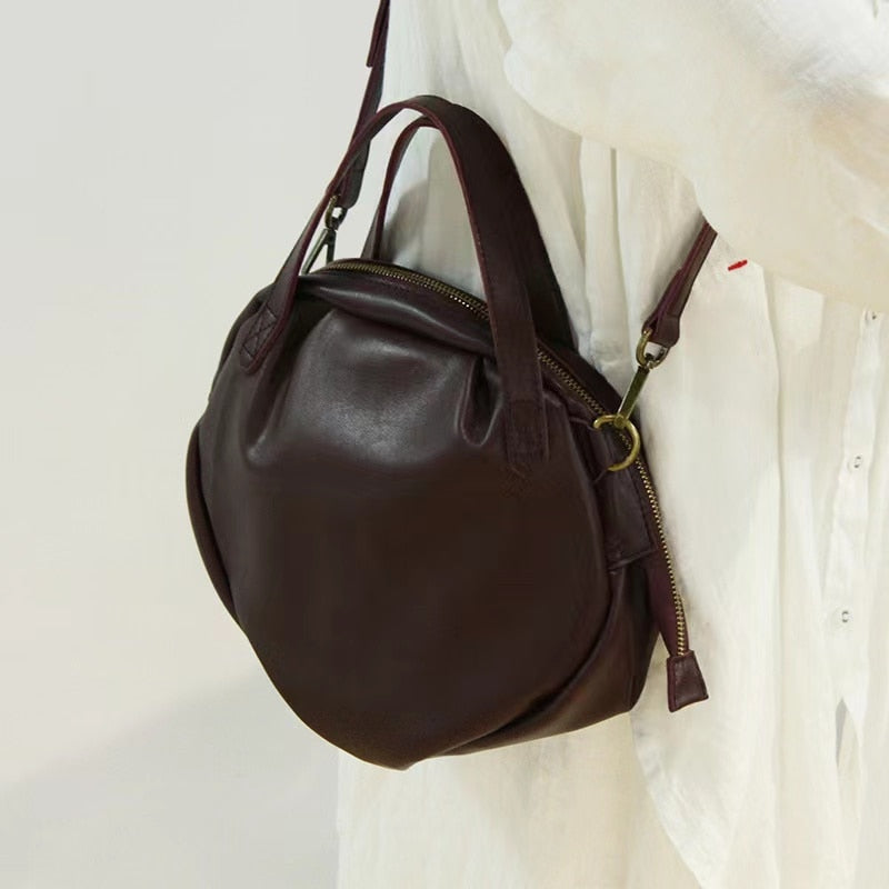 new first layer cowhide irregular round soft leather women&#39;s handbag solid color shoulder bag