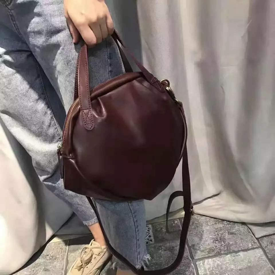 new first layer cowhide irregular round soft leather women&#39;s handbag solid color shoulder bag