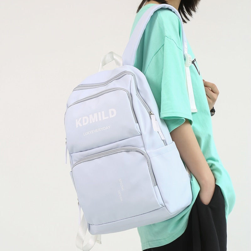 DCIMOR Fashion Letter Printing Women Backpack Solid Nylon Men Cool Travel Book Bag Schoolbag College Lady Laptop Backpack Kawaii
