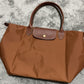 Autumn and winter new nylon cognac color dumpling bag women&#39;s  portable shoulder bag cowhide leather mummy bag